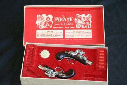 A PAIR OF RARE PIRATE FLINTLOCK PISTOLS IN THE ORIGINAL BOX!!! YOU DO NOT FIND THESE! AMAZING PIECE!