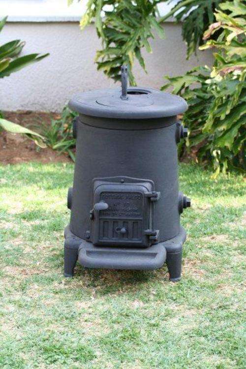 A FALKIRK "COTTAGE FALCO No10" COAL STOVE WITH WATER JACKET!!! THIS IS COOL AND COLLECTABLE...
