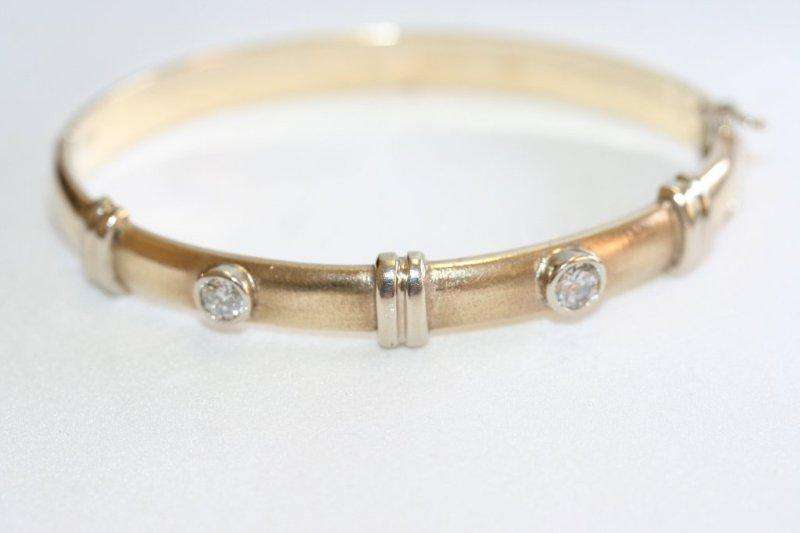 SOLID 9ct GOLD BRACELET (32.2grams) SET WITH 2 x (.45 & .37) DIAMONDS!!! COMES WITH CERTIFICATE...