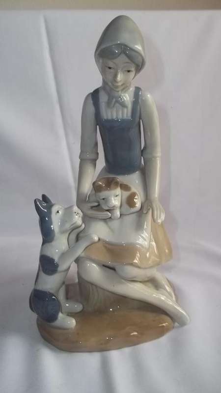 CUTEST PORCELAINE STATUETTE OF A YOUNG GIRLS PLAYING WITH HER DOGS