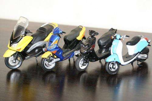 A STUNNING COLLECTION OF 4 SCOOTERS!!! ONE BID FOR ALL...