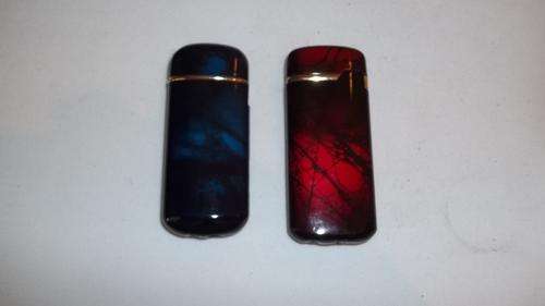 TWO STUNNING REFILLABLE BUTANE CIGARETTE LIGHTERS IN RED AND BLUE - QUITE AWESOME