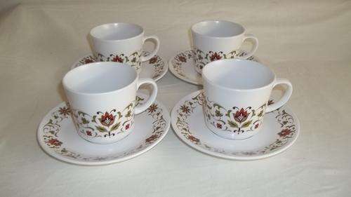 A MAGNIFICENT NORITAKE OF JAPAN "PROGRESSION SERIES" FINE BONE CHINA SET OF FOUR CUPS AND SAUCERS