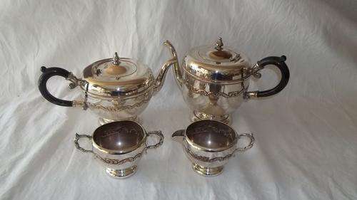 A BEAUTIFUL EM-MESS VINTAGE SILVER PLATED TEA SET WITH COFFEE POT, TEAPOT, SUGAR BOWL AND MILK JUG