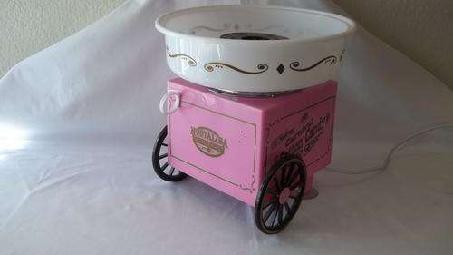 AN AWESOME PINK AND WHITE CANDY FLOSS MACHINE THAT ACTUALLY WORKS - GREAT FOR THE KIDS