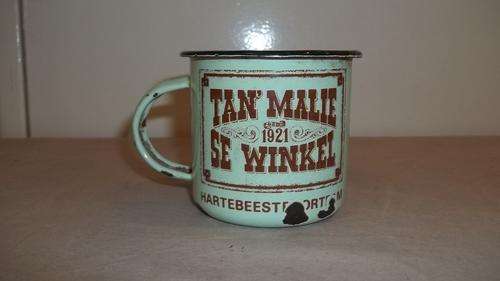 A FANTASTIC GREEN ENAMEL "TAN' MALIE SE WINKEL" COFFEE MUG - A GREAT COLLECTORS PIECE