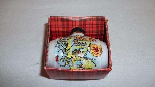 A VERY UNUSUAL "MOUNTAIN HEATHER" MEN'S FRAGRANCE IN A BARREL SHAPED BOTTLE FROM SCOTLAND