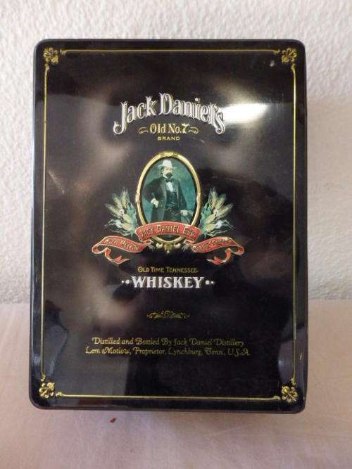 AN AWESOME AND VERY COLLECTIBLE JACK DANIELS TIN WITH HINGED LID.