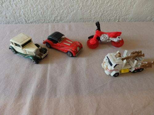 AN AWESOME ASSORTMENT OF CARS INCLUDING MATCHBOX, MAJORETTE AND HOTWHEELS.