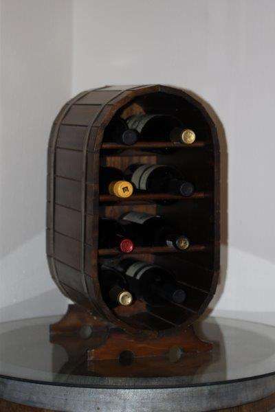 A STUNNING 8-BOTTLE BARREL TYPE WINE RACK MADE FROM BRASS AND OAK WOOD!!! AWESOME...