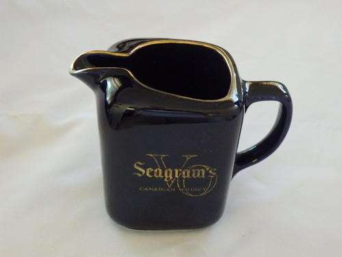 A STUNNING COBALT BLUE SEAGRAMS CANADIAN WHISKEY WATER JUG WITH GOLD TRIM
