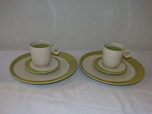 TWO STUNNING WHITE AND OLIVE GREEN "TRIO's" CONSISTING OF DEMITASSE CUPS, SAUCERS AND CAKE PLATES