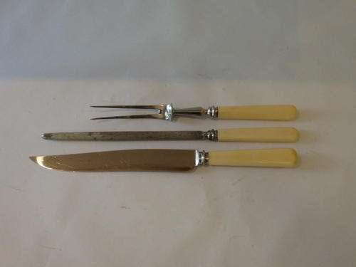 A STUNNING VINTAGE "ROBERT F. MOSLEY" OF ENGLAND CARVING SET WITH KNIFE, FORK AND SHARPENING STEEL