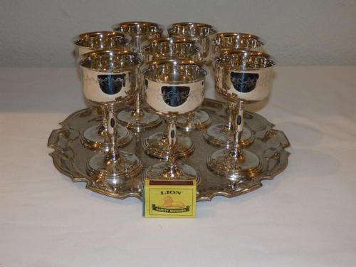 A MAGNIFICENT SET OF EIGHT VINTAGE SILVER PLATED GOBLETS ON A SERVING TRAY WITH BEAUTIFUL ENGRAVING