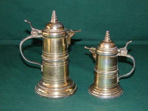 TWO AWESOME AND QUITE UNUSUAL METAL VINEGAR AND OLIVE OIL LIDDED DECANTERS