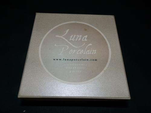 A SPECTACULAR BOXED SET OF FOUR WHITE LUNA PORCELAIN TRANSLUCENCY BOWLS