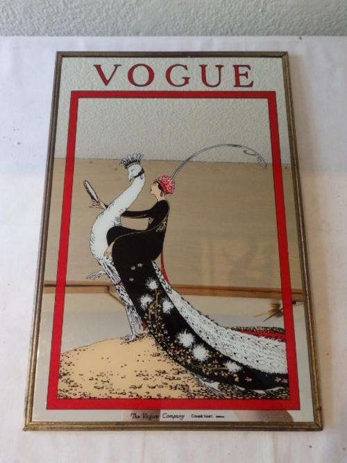 AN AWESOME VINTAGE VOGUE MIRROR WITH THE IMAGE THAT WAS USED ON A PUBLICATION IN 1918