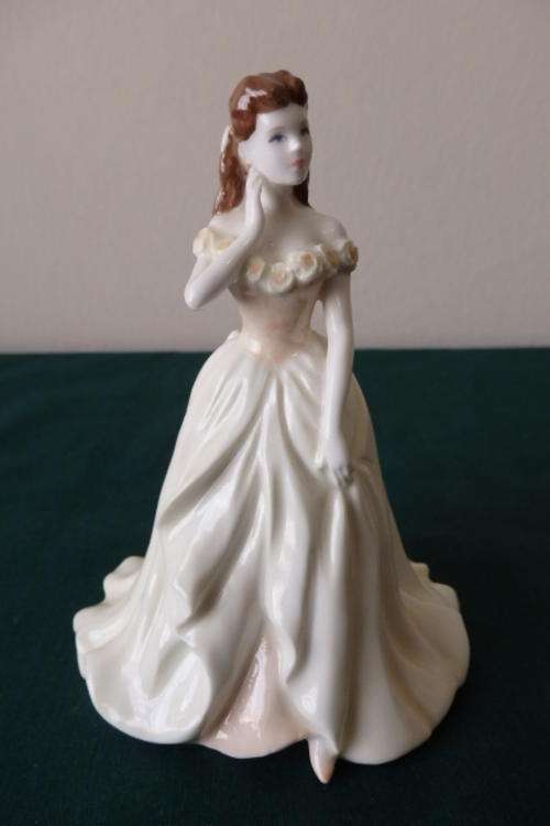 A SPECTACULAR AND RARE COALPORT OF ENGLAND "DEBUTANTE - LAUREN" BONE CHINA FIGURINE