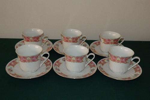 AN EXQUISITE RICHWOOD OF USA PORCELAIN SET OF SIX CUPS AND SAUCERS