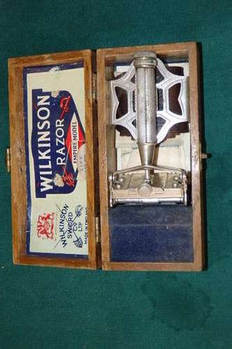 AN AMAZING AND VERY RARE ANTIQUE WILKINSON SWORD RAZOR "EMPIRE MODEL" IN ITS ORIGINAL BOX