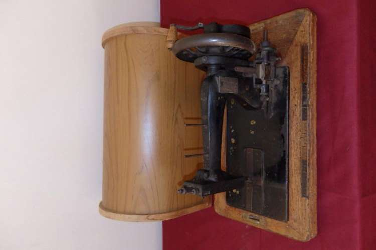 A MAGNIFICENT ANTIQUE (c1900's) HAND CRANKED SEWING MACHINE IN A DOME BOX CASE