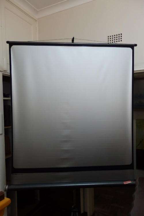AN AWESOME VINTAGE F.I.N.S. OF ITALY "JOLLY" COMPACT PORTABLE PROJECTOR SCREEN IN GREAT CONDITION