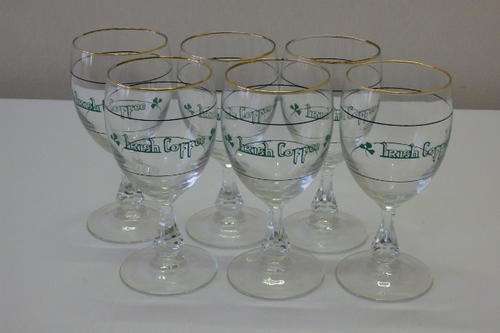 A FANTASTIC SET OF SIX STEMMED IRISH COFFEE GLASSES WITH QUANTITY INDICATORS