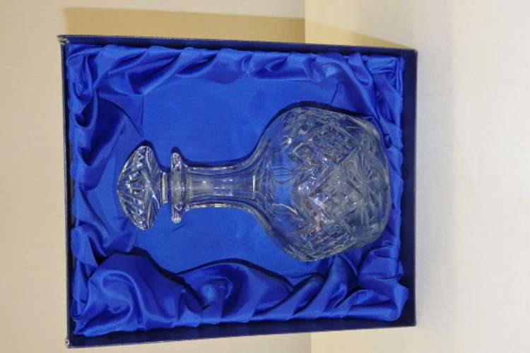 A SPECTACULAR LEAD CUT CRYSTAL LIQUEUR DECANTER IN IT'S ORIGINAL SATIN LINED BOX
