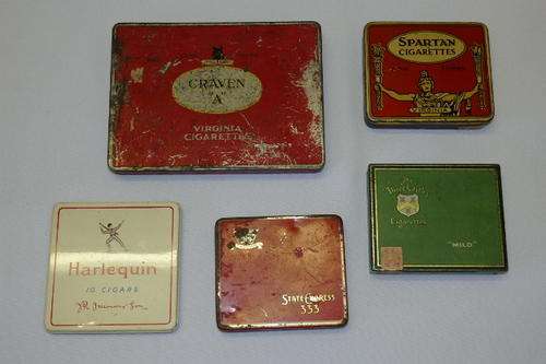 AN AWESOME COLLECTION OF FIVE PRETTY RARE VINTAGE AND ANTIQUE COLLECTABLE METAL CIGARETTE TINS