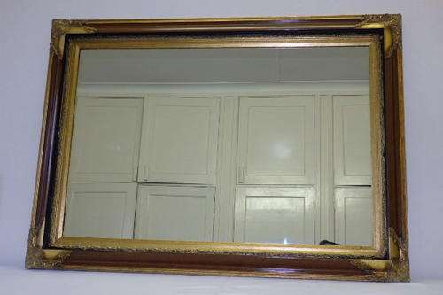 A SPECTACULAR BROWN AND GOLD ORNATE MOULDED FRAMED MIRROR IN FANTASTIC CONDITION