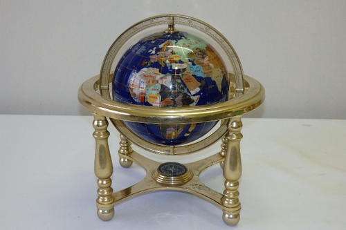 A MAGNIFICENT ROYAL BLUE "LAPIS LAZULI" EARTH GLOBE WITH SEMI PRECIOUS STONE INLAYS ON A BRASS STAND