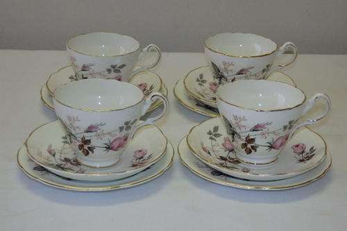 A STUNNING JACKSON & GOSLING OF ENGLAND "GROSVENOR" BONE CHINA 12 PIECE TEA SET