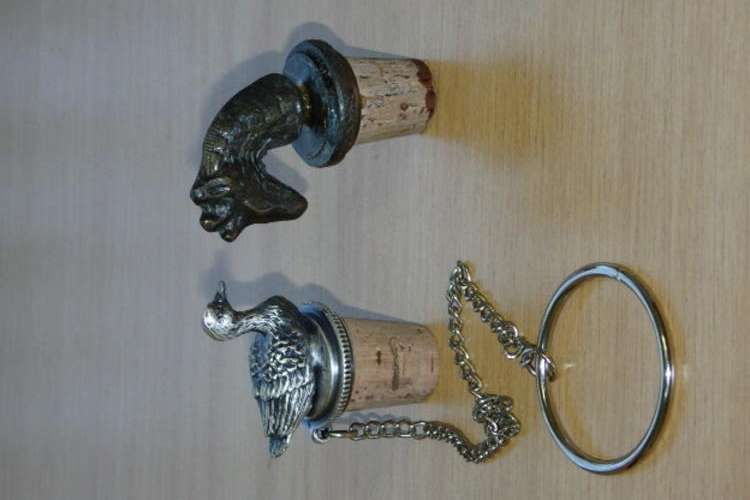 TWO STUNNING METAL AND CORK WINE BOTTLE STOPPERS INCLUDING A DUCK STOPPER ON A CHAIN bid/stopper