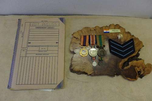 A FANTASTIC MEDAL BOARD FOR FLIGHT SERGEANT ML PREUSS WITH A PROPATRIA, GENERAL & GOOD SERVICE MEDAL