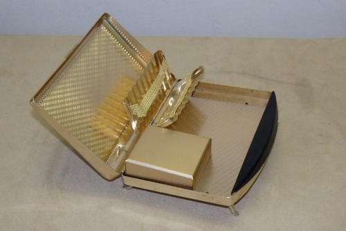 AN AWESOME AND UNUSUAL EGYPTIAN THEMED "ENAMELLED" AND GOLD PLATED MUSICAL CIGARETTE BOX