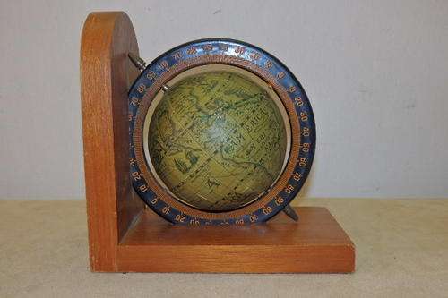 AN AWESOME ORNAMENTAL ANTIQUE STYLE GLOBE MOUNTED ON A WOODEN STAND