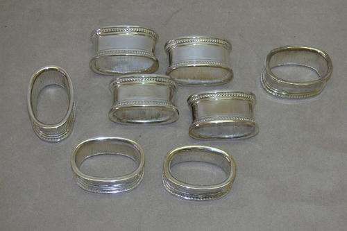 TWO AWESOME BOXED SETS (4 PER BOX) OF ELWECO SILVER PLATED SERVIETTE RINGS IN GREAT CONDITION