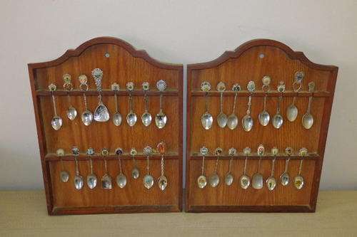 TWO FANTASTIC COLLECTABLE TEASPOON SETS IN WALL MOUNTABLE WOODEN TEASPOON HOLDERS