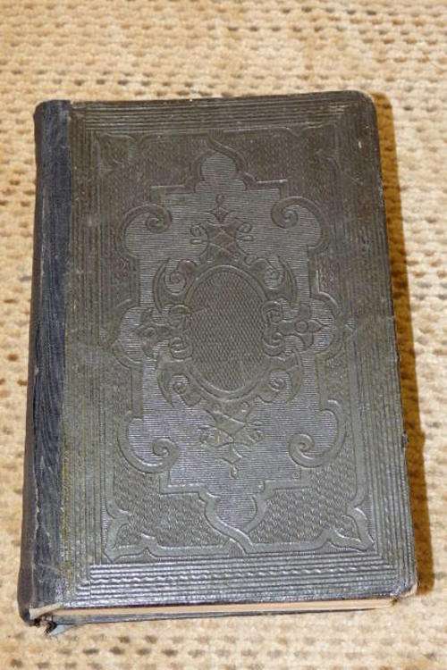 AN INCREDIBLE ANTIQUE (1889) DUTCH "BIJBEL" WITH THE OLD AND NEW TESTAMENTS AND AN EMBOSSED COVER