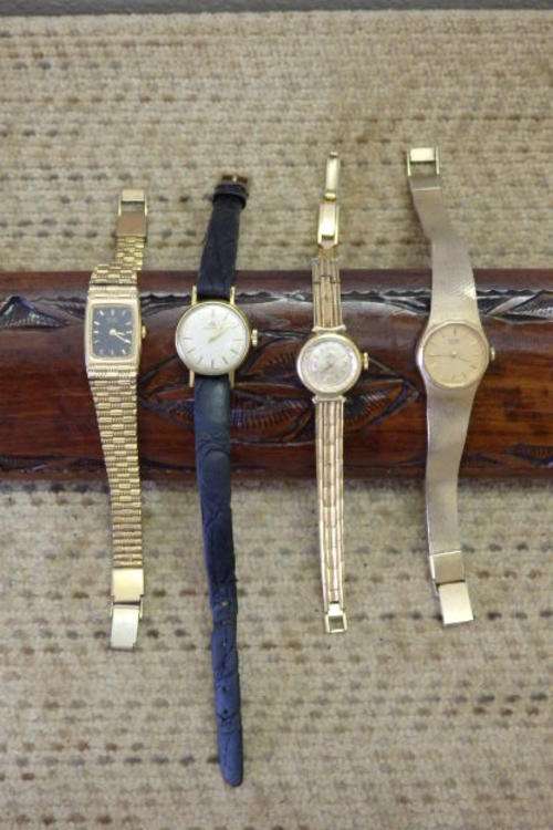 AN AWESOME COLLECTION OF FOUR LADIES WRIST WATCHES = IDEAL FOR RESTORATION OR SPARES