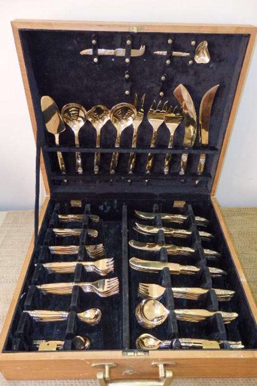 A SPECTACULAR NICKEL-BRONZE (DURAGOLD) SIAMESE BOXED 98 PIECE CUTLERY SET