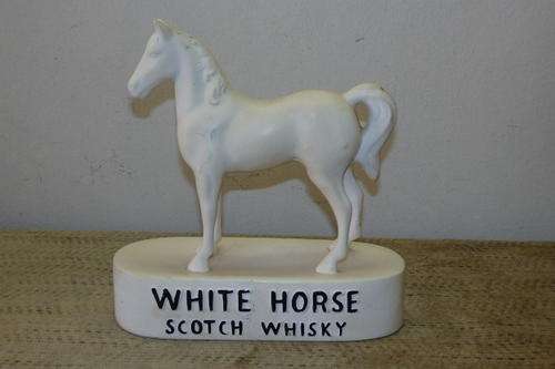 AN AMAZING AND QUITE UNUSUAL CERAMIC "WHITE HORSE/ WIT PERD" WHISKEY BAR DISPLAY ORNAMENT