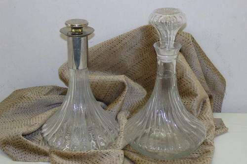 TWO STUNNING "BROAD BOTTOMED" GLASS "SHIPS" DECANTERS INCLUDING ONE WITH A SILVER PLATED STOPPER