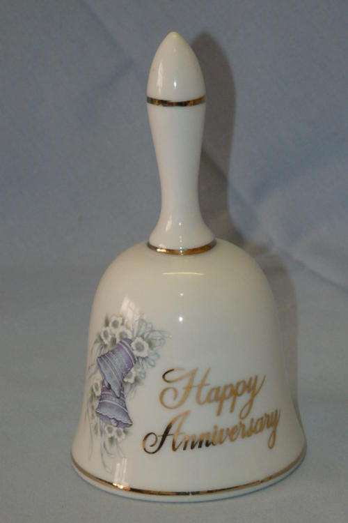 AN AWESOME STAFEX OF JAPAN "HAPPY ANNIVERSARY" PORCELAIN HAND BELL WITH IT'S ORIGINAL CLANGER