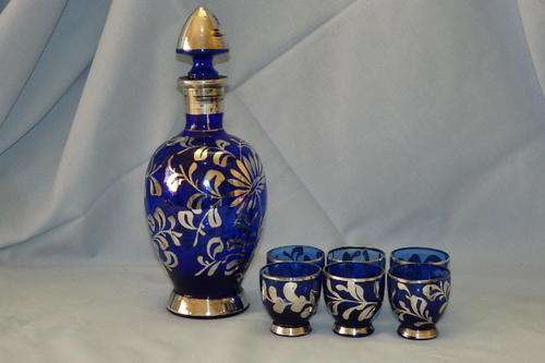 A SPECTACULAR VINTAGE VENETIAN COBALT BLUE GLASS LIQUEUR DECANTER SET WITH SILVER OVERLAY