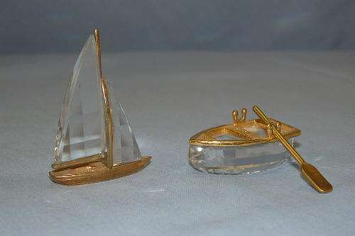 TWO FANTASTIC SWAROVSKI CRYSTAL MINIATURE ORNAMENTS INCLUDING A SAILING BOAT AND A ROWING BOAT