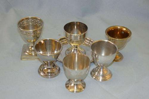 A WONDERFUL COLLECTION OF SIX ASSORTED VINTAGE SILVER PLATED EGG CUPS