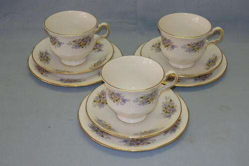 THREE STUNNING QUEEN ANNE OF ENGLAND BONE CHINA TROI'S CONSISTING  CUPS, SAUCERS & CAKE PLATES