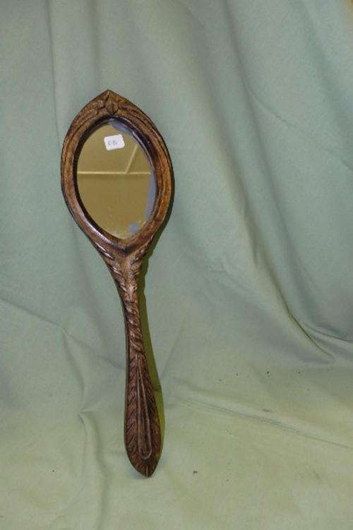 A VERY UNUSUAL VINTAGE HANDMADE AND HAND CARVED WOODEN LADIES VANITY MIRROR