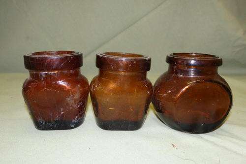 THREE AWESOME COLLECTIBLE VINTAGE/ ANTIQUE? GLASS MARMITE AND OXO SPREAD BOTTLES